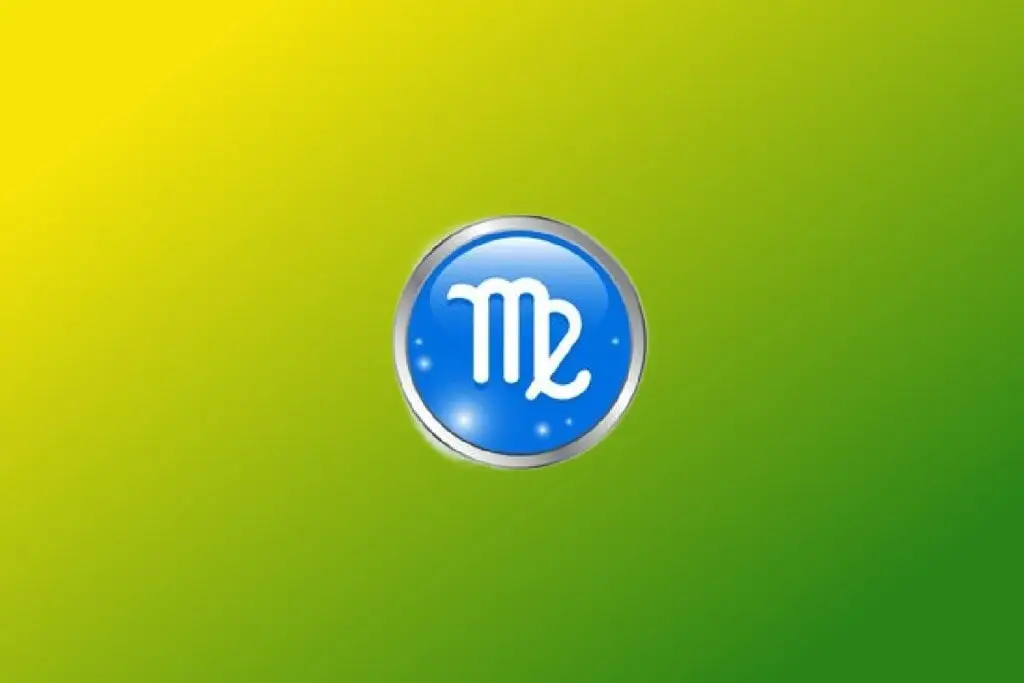 Ilustração do signo de Virgem com símbolo branco curvado semelhante a um M em círculo azul com borda prateada sobre fundo verde e amarelo