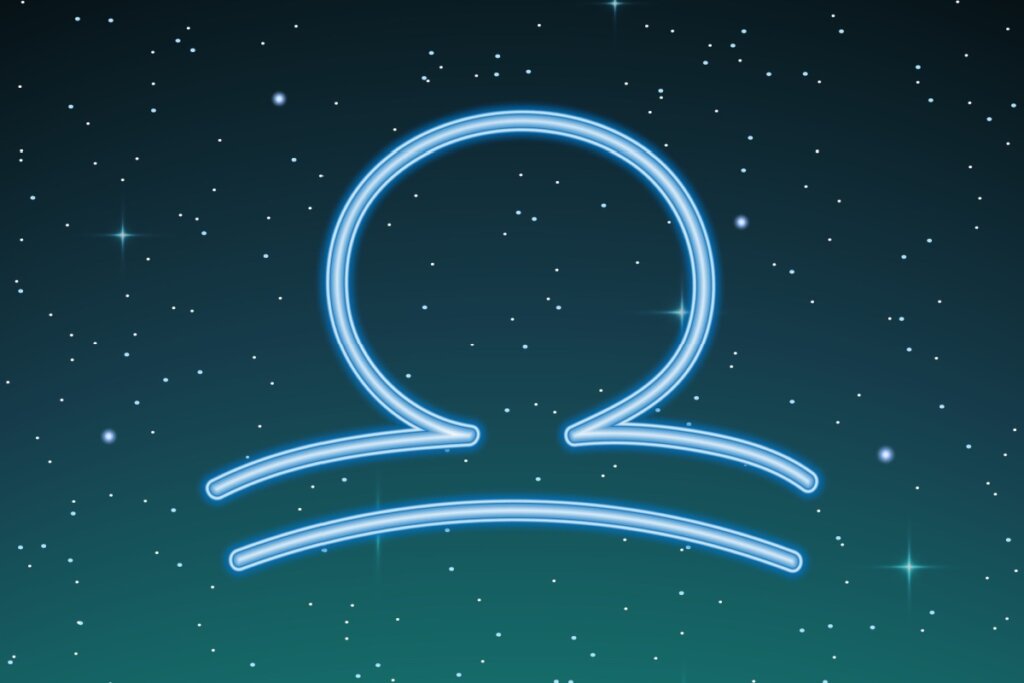 ilustração azul do símbolo de libra sobre fundo esverdeado com estrelas
